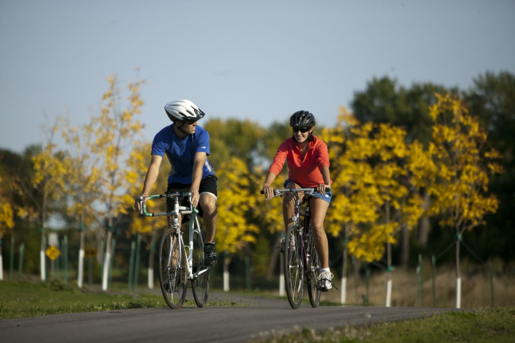 Couple Biking on Grand Forks Greenway Trail in Grand Forks North Dakota