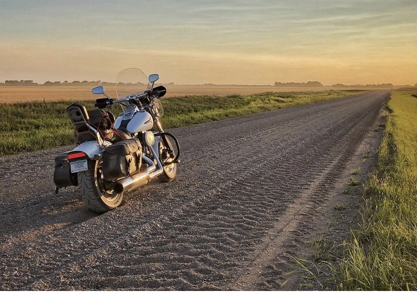 motorcyle-sunset Motorcycle on a gravel road at sunset