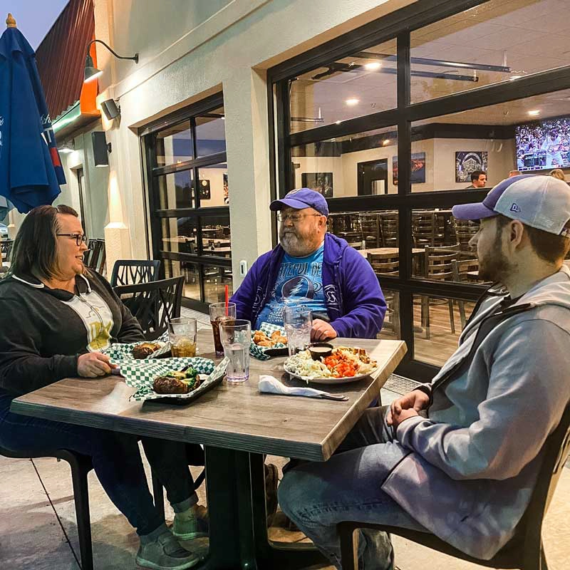 lisa-and-eric-on-patio Lisa and her family at the Ground Round Patio