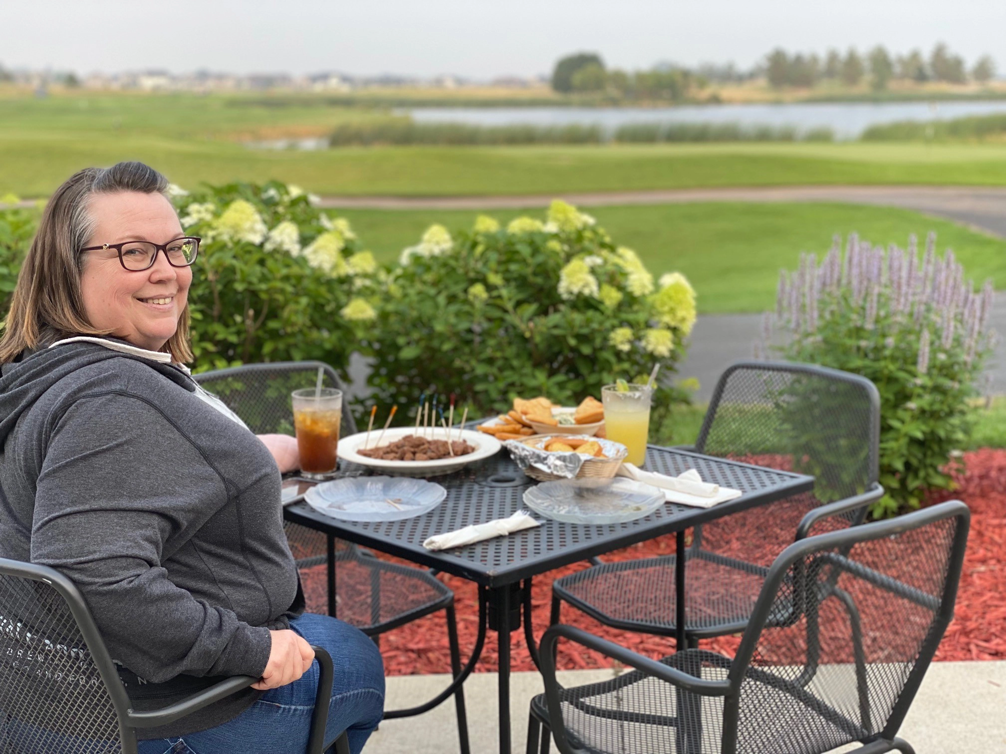 lisa-patio-grand-forks-kings-walk Lisa on the patio at King's Walk Golf Course