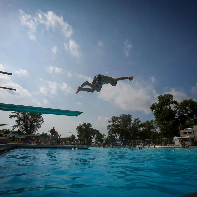 riverside-pool Kid jumping into the Riverside Pool in Grand Forks