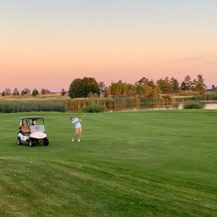 kings-walk-golf-course-grand-forks King's Walk golf course in Grand Forks at sunset.