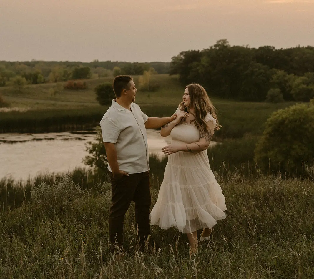 Couple-Field-Grand-Forks-Cropped Couple in a field in the Grand Forks County Region at sunset