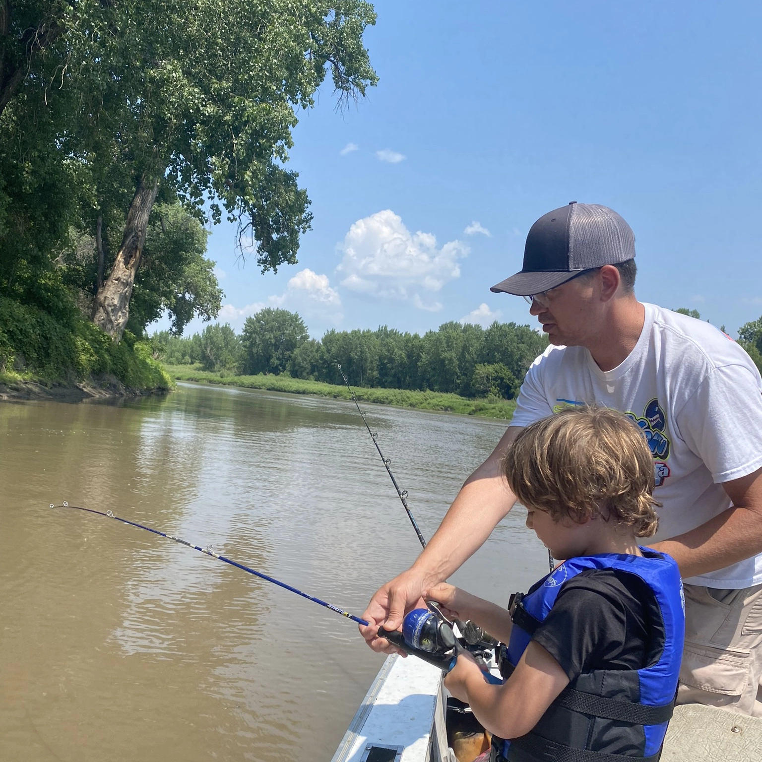 fishing-on-the-red-river Wade Anderson instructs Jude Anderson on how to catch a fish on the Red River.