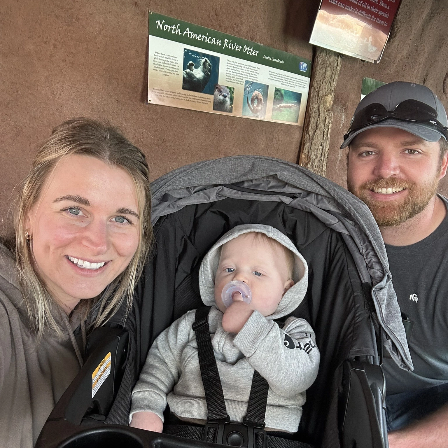 fargo-day-trip-from-grand-forks Mom, dad, and baby at the Red River Zoo in Fargo.