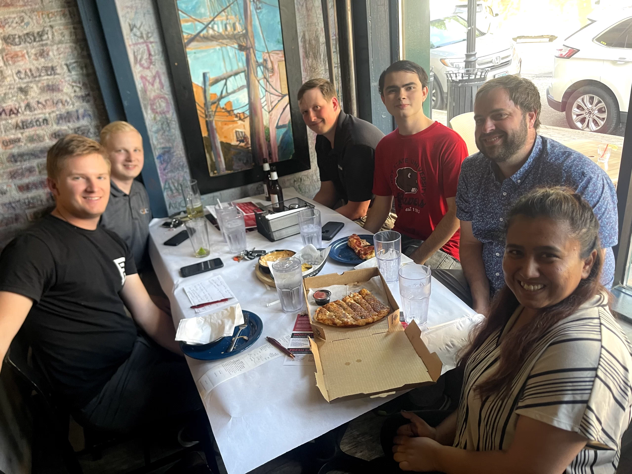 international-students-in-grand-forks-networking International students in Grand Forks at dinner at Rhombus Guys Pizza.