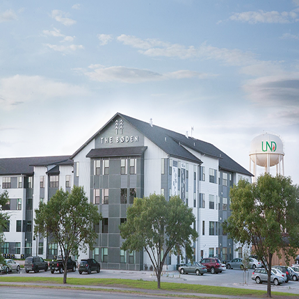 The Boden - Exterior APPROVED Exterior of Boden Apartments. Mulitshades of Grey make up the facade. Lots of windows.
