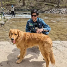 Adrian and Pup at Turtle River Author Adrian poses at Turtle River with his pup!