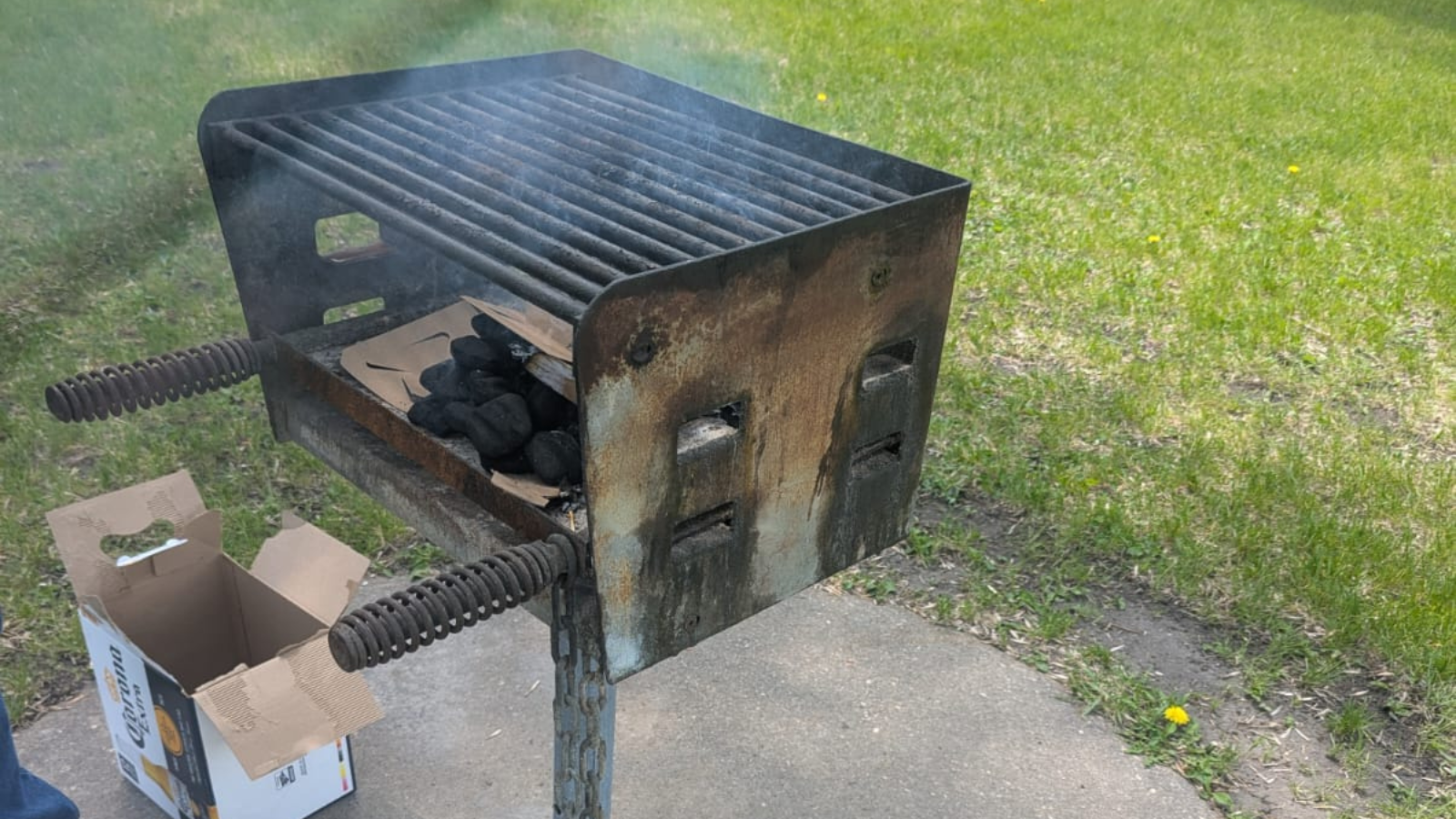 Grillin' at the Park! Author Adrian snaps a pic of one of the usable park barbeque grills! Coal Away!