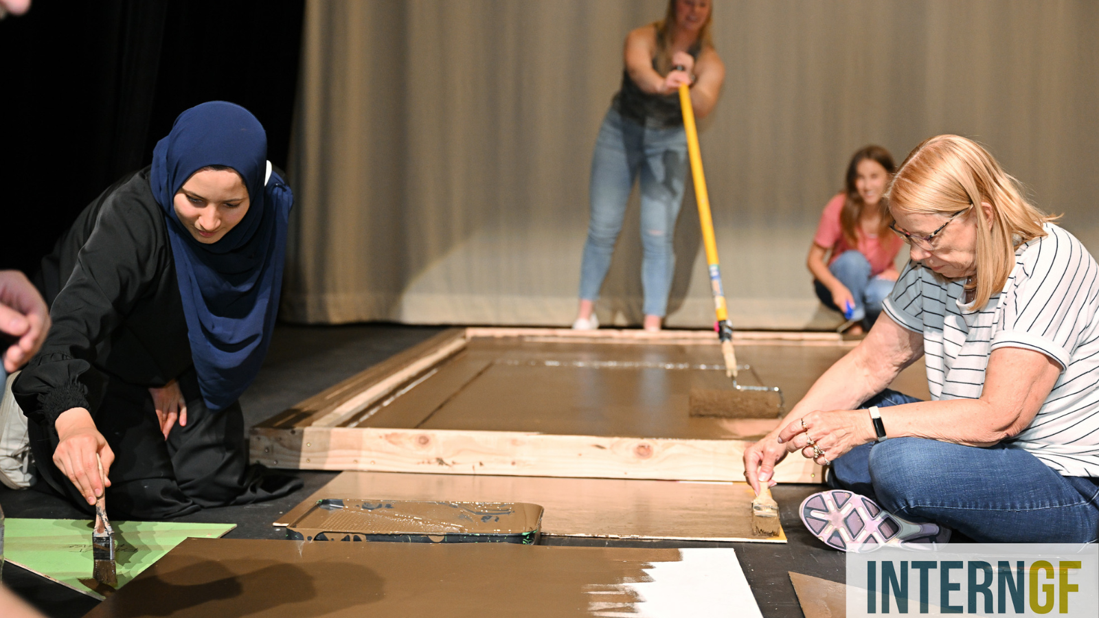 Building Sets InternGF photos of interns helping build probs for a theater production.