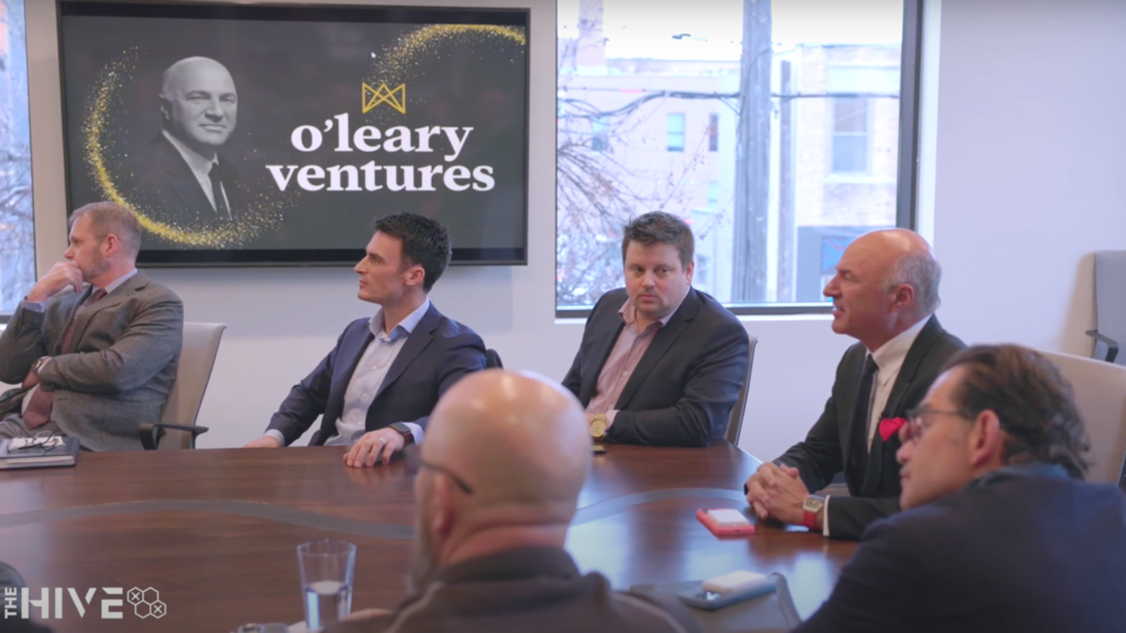 O'Leary Ventures Hive Meeting Photo Kevin O'Leary sits in the board room at The Hive alongside Johnny, The Mayor, and Keith Lund, discussing UAS ecosystem in Grand Forks
