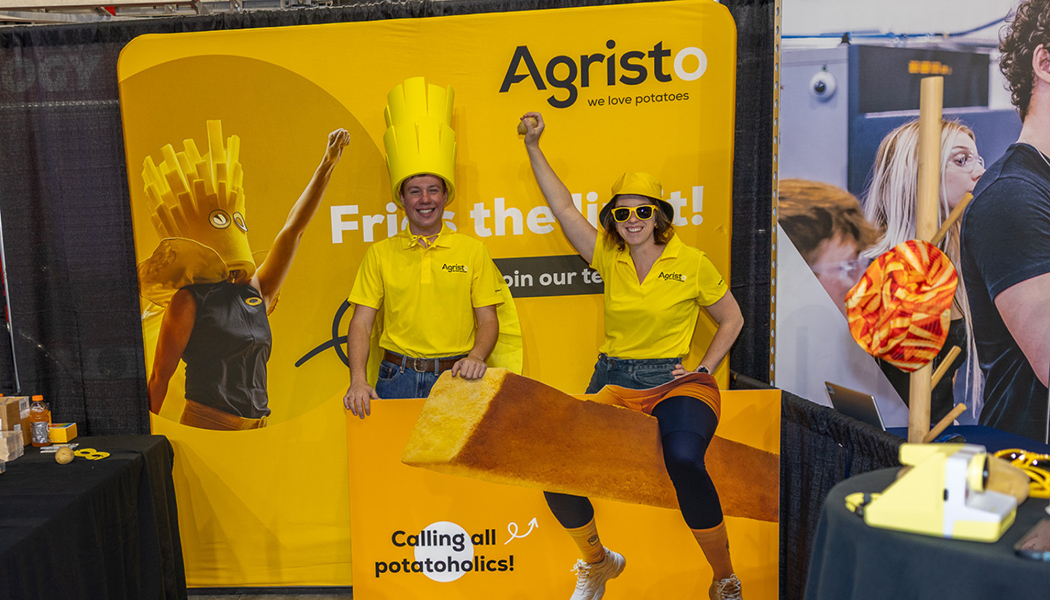 Agristo Two Agristo employees pose with their banner at the annual Northern Valley Career Expo