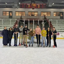 GGFYP Broomball Group Photo A group of ggfyp members stand together on the ice at the EGF Civic Center for the annual broomball session!