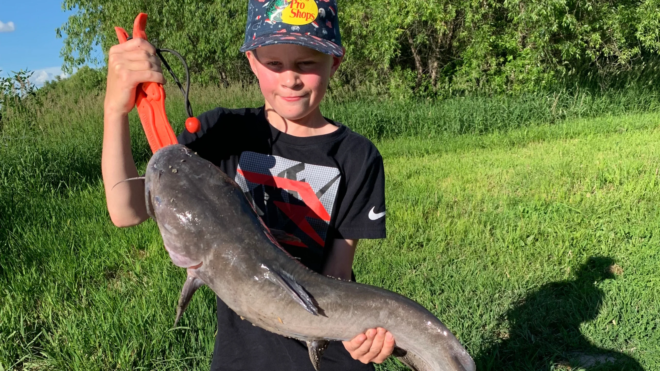 Fisherman Hudson Vandervort caught a big catfish off the Red River shore fishing!