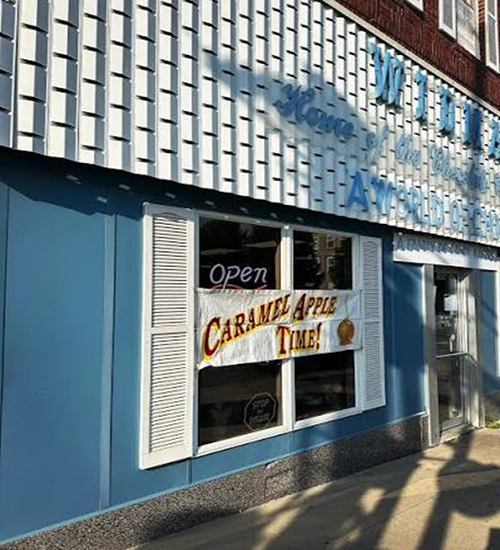 Widman's candy shop has their season caramel apples sign out front!